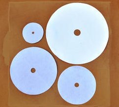 Circular industrial filter pads with centre openings in several diameters