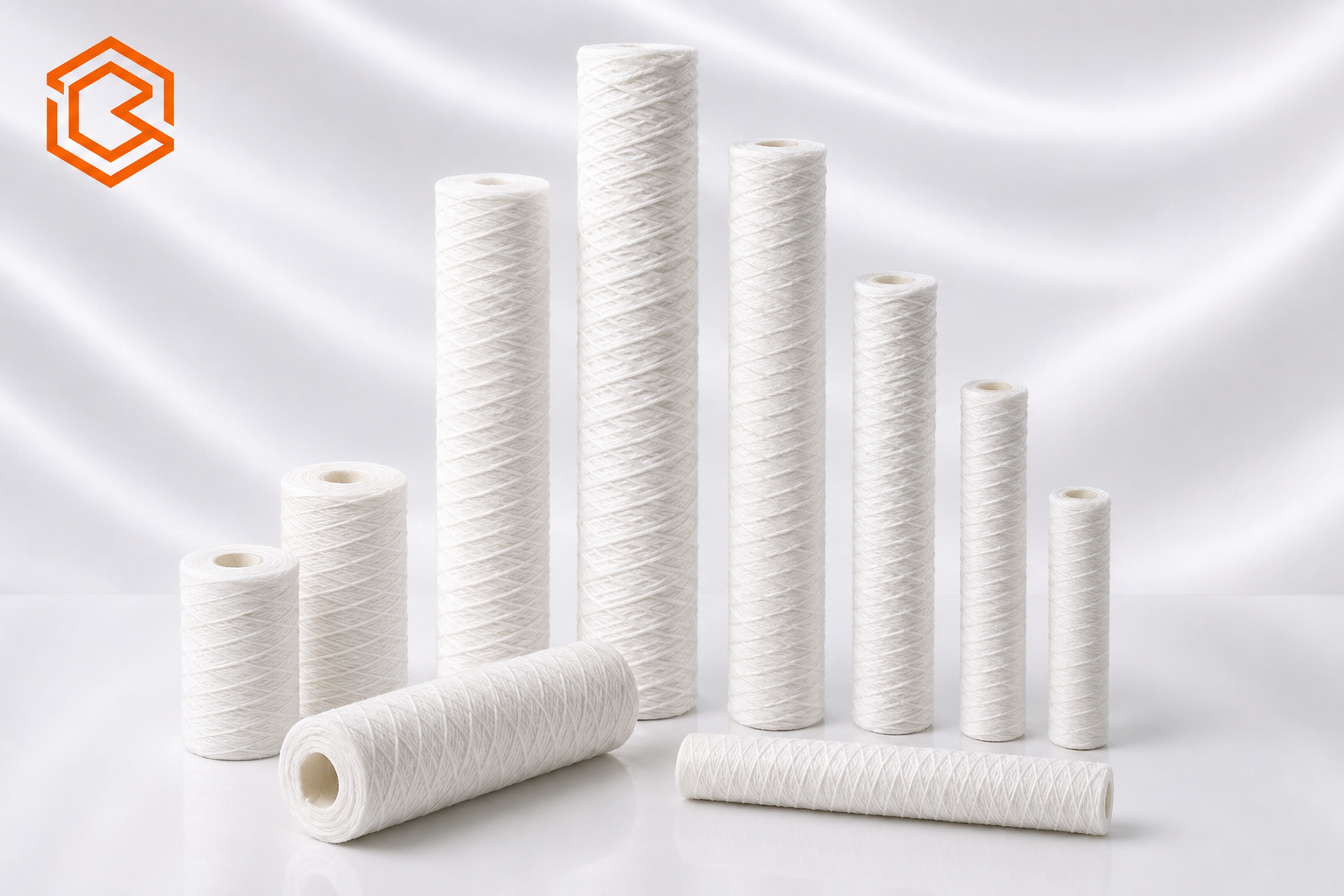 Yarn-wound filter cartridges in multiple lengths and diameters
